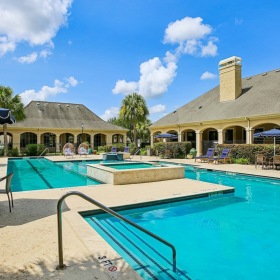 pool with lounge chairs